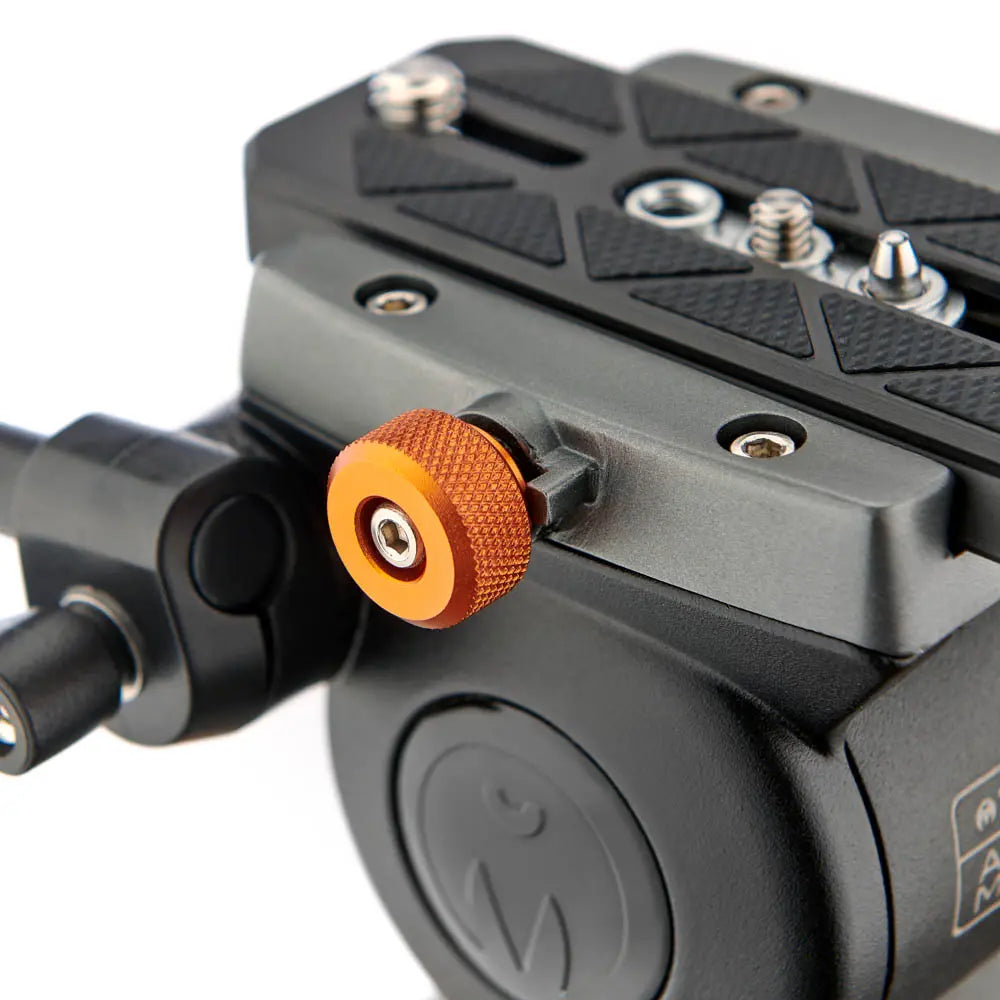 Close-up of a camera mount with an orange knob on a white background