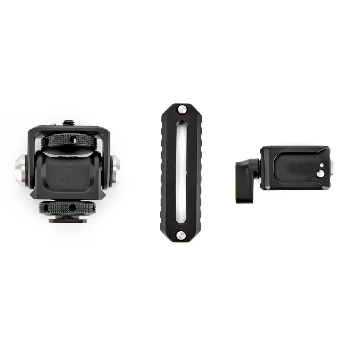 Three black camera accessories on a white background