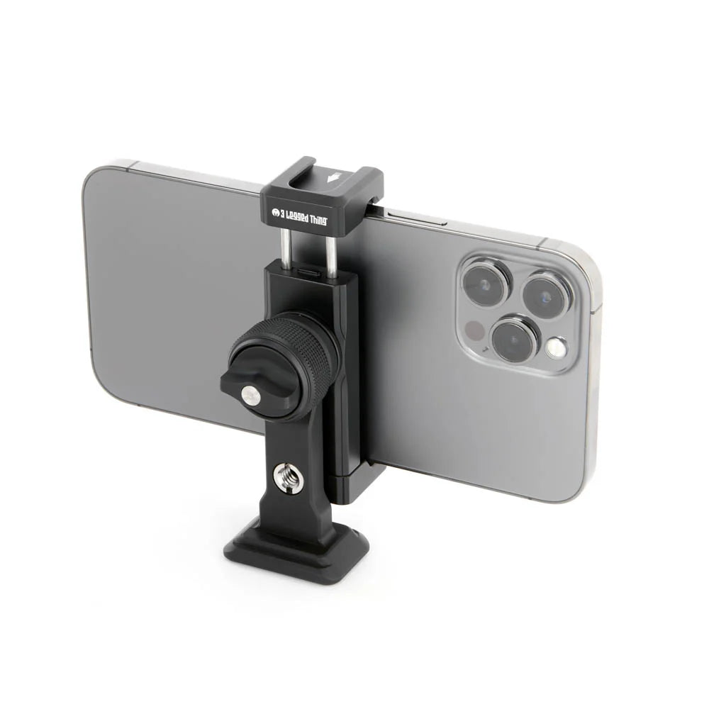 A black phone mount clamp holding a gray smartphone, shown on a clean white background.