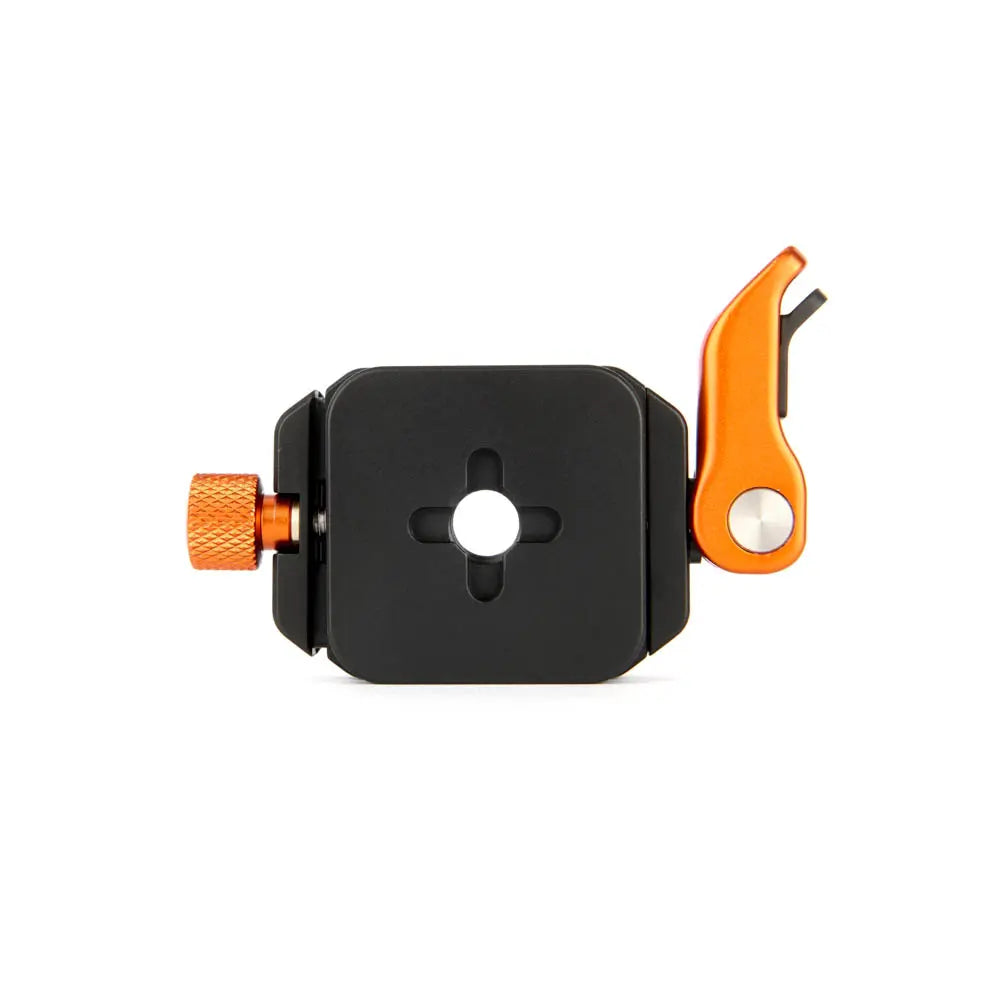 Black and orange mechanical component on a white background