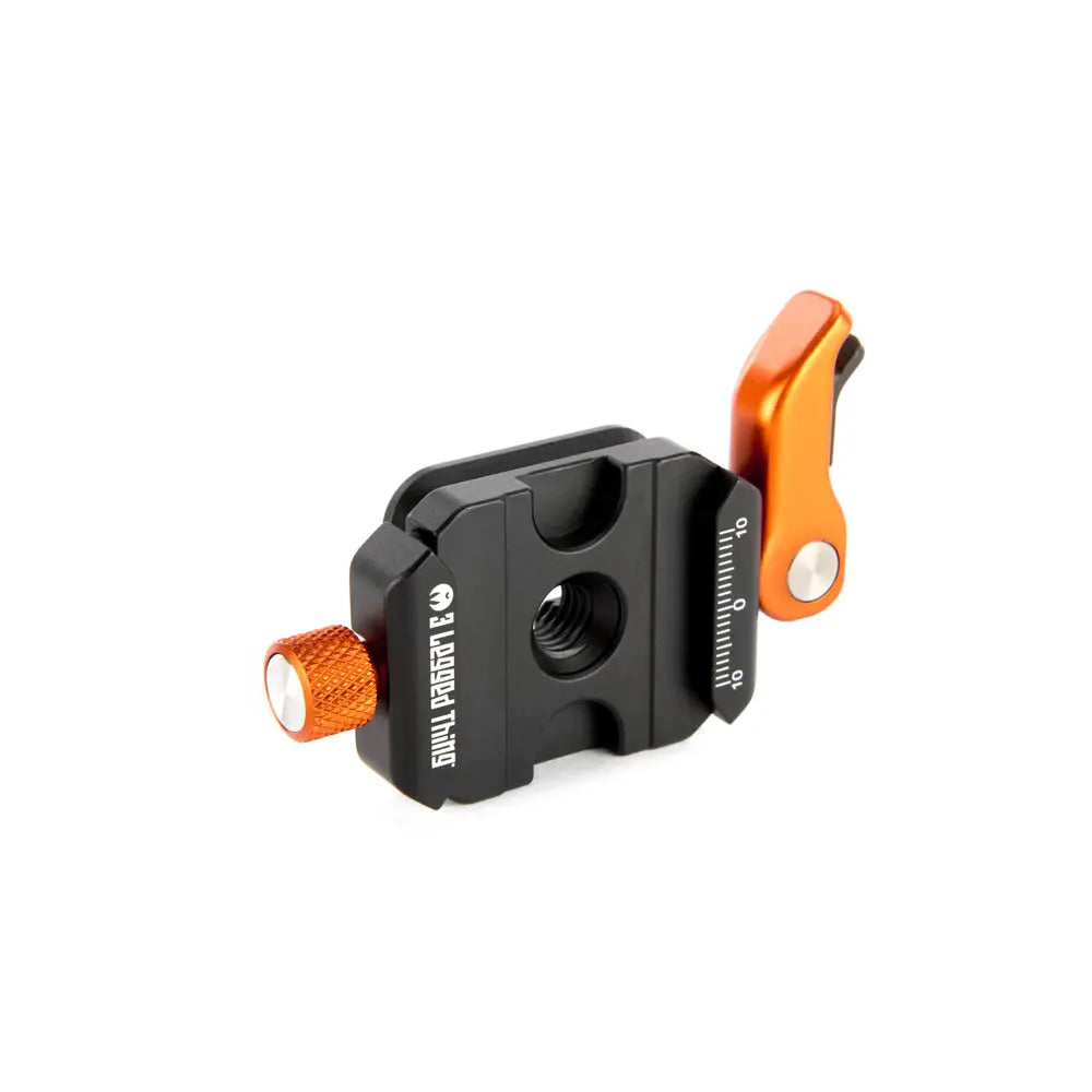 Camera lens adapter with orange and black design on a white background