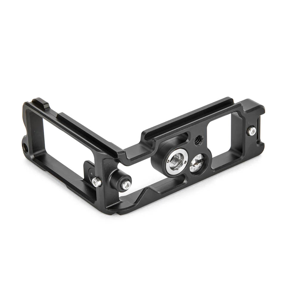 Black metal camera cage on a white background