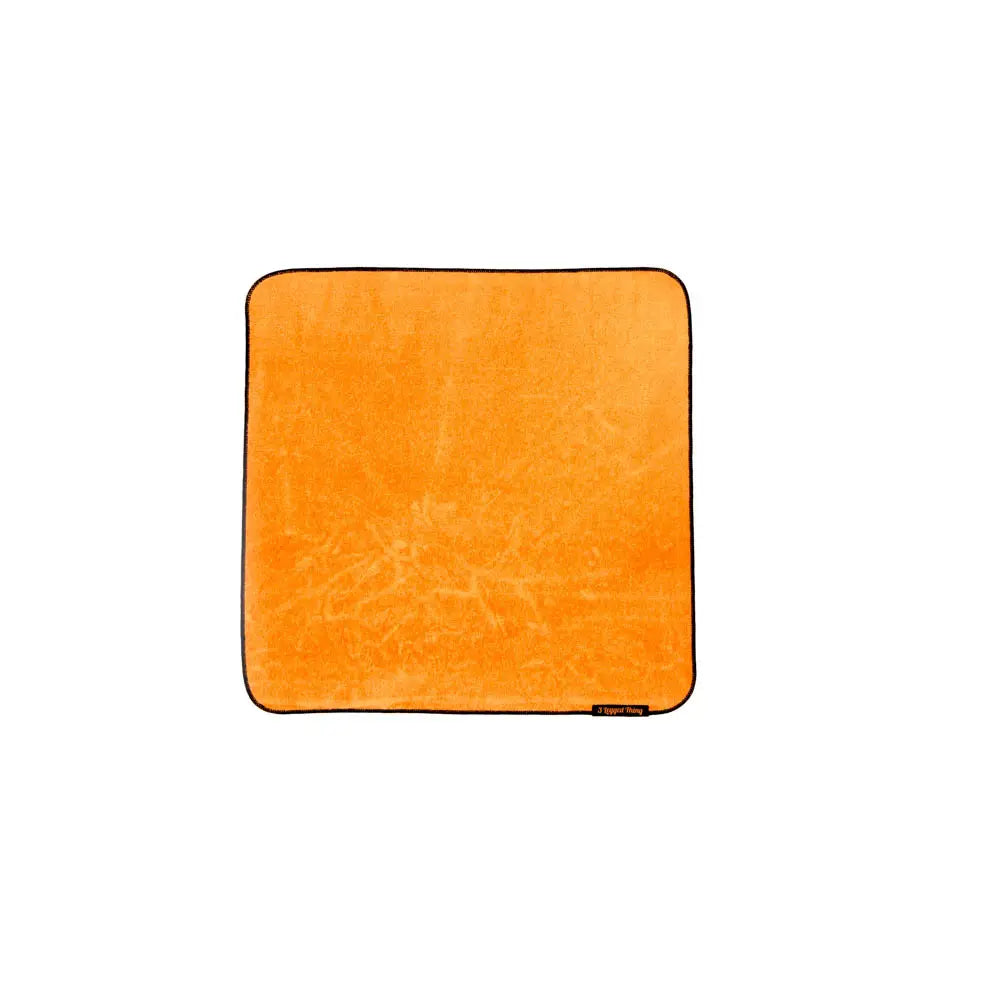Orange square towel on a white background