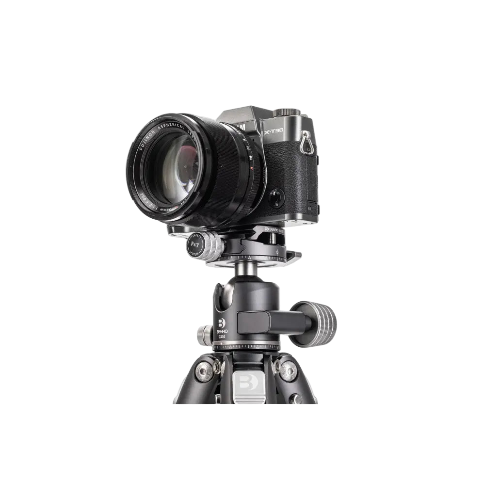 Camera on a tripod with a white background