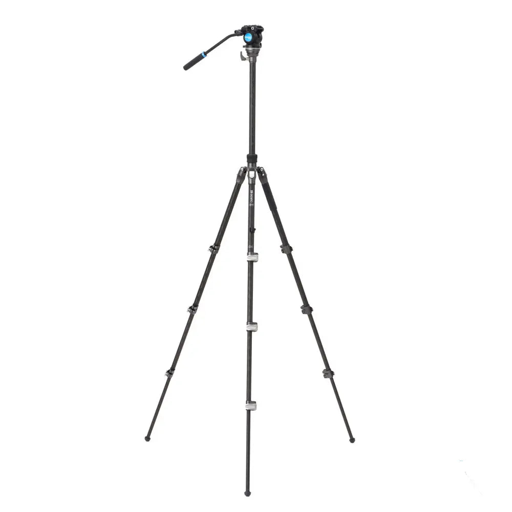 Black camera tripod on a white background