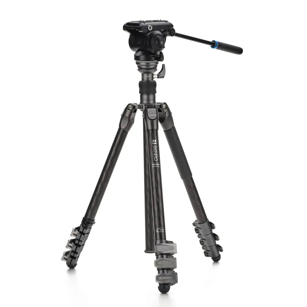 Camera tripod with head on a white background