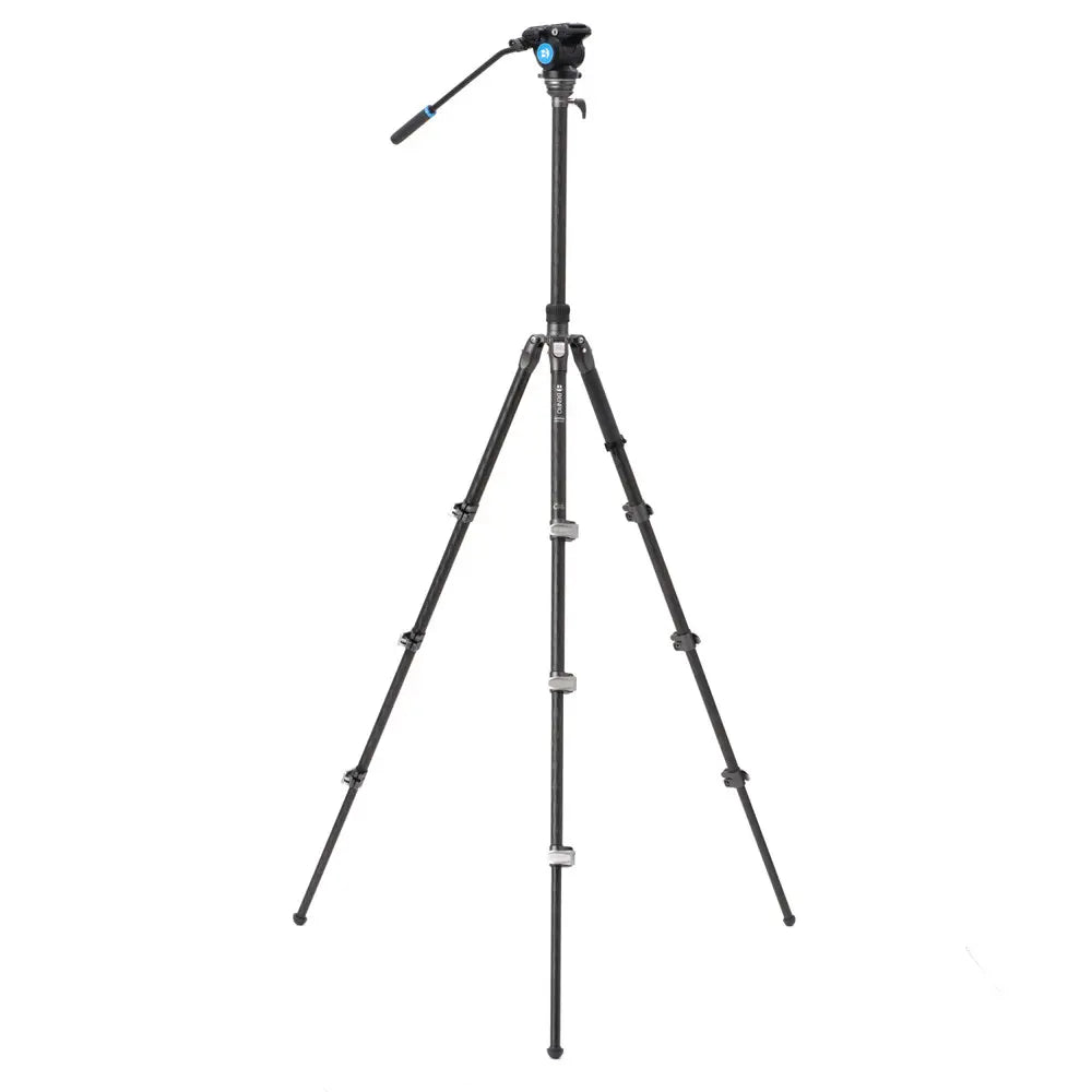 Black camera tripod on a white background