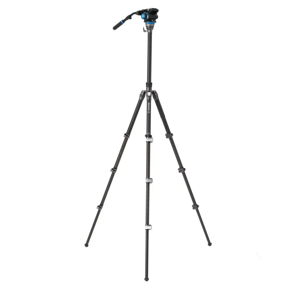Black camera tripod on a white background