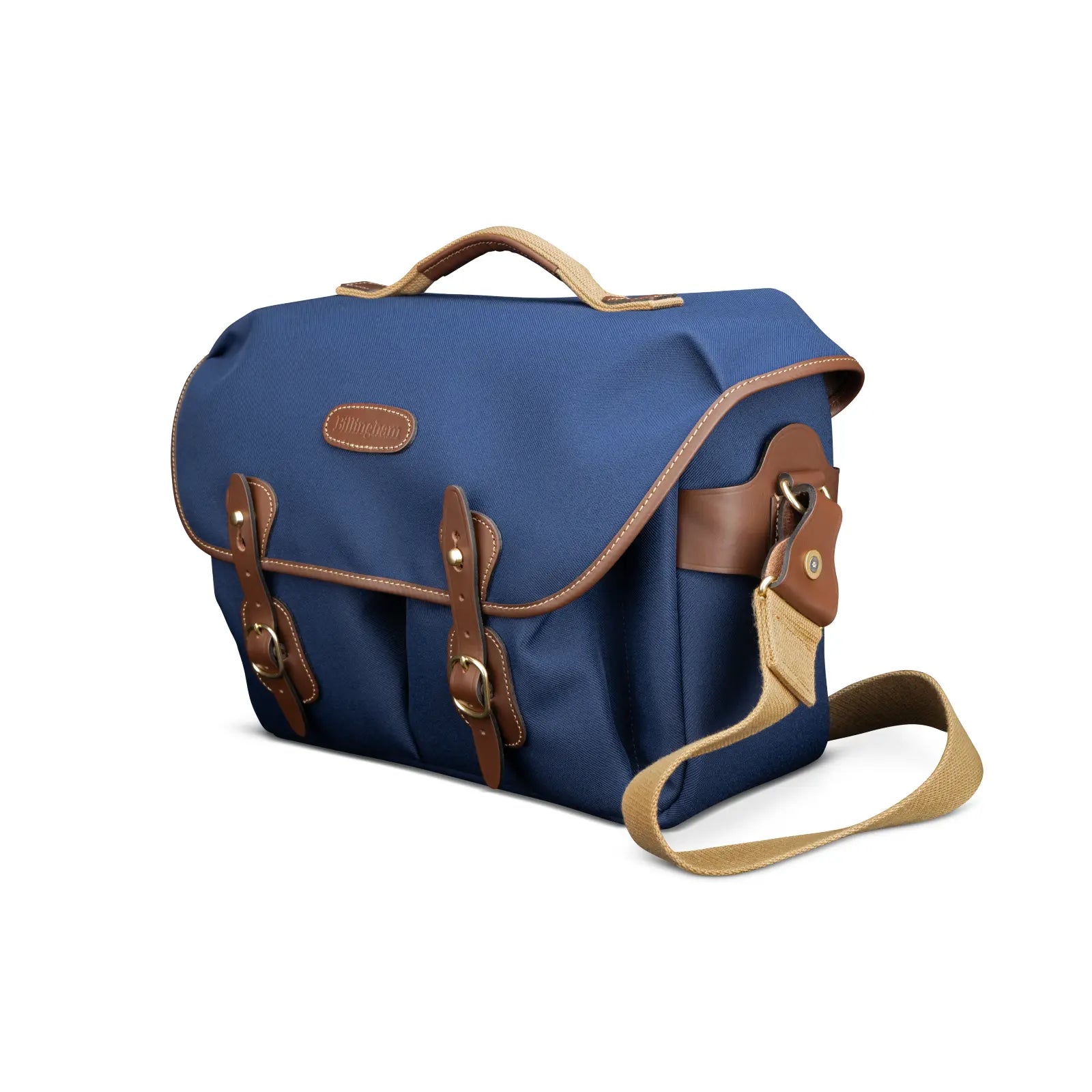 Blue bag with brown leather straps and handle on a white background