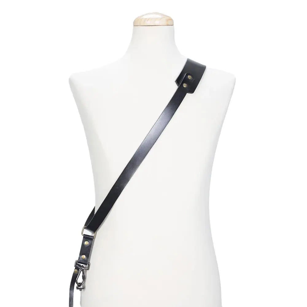 Black leather strap on a mannequin with a white background