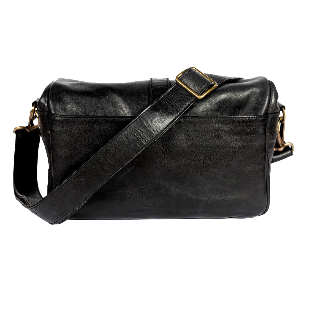 Black leather bag with a strap on a white background
