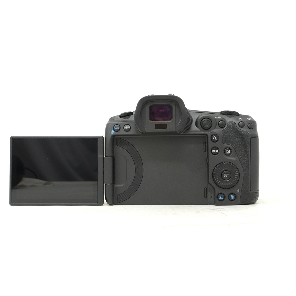 Camera with flip-out screen on a white background