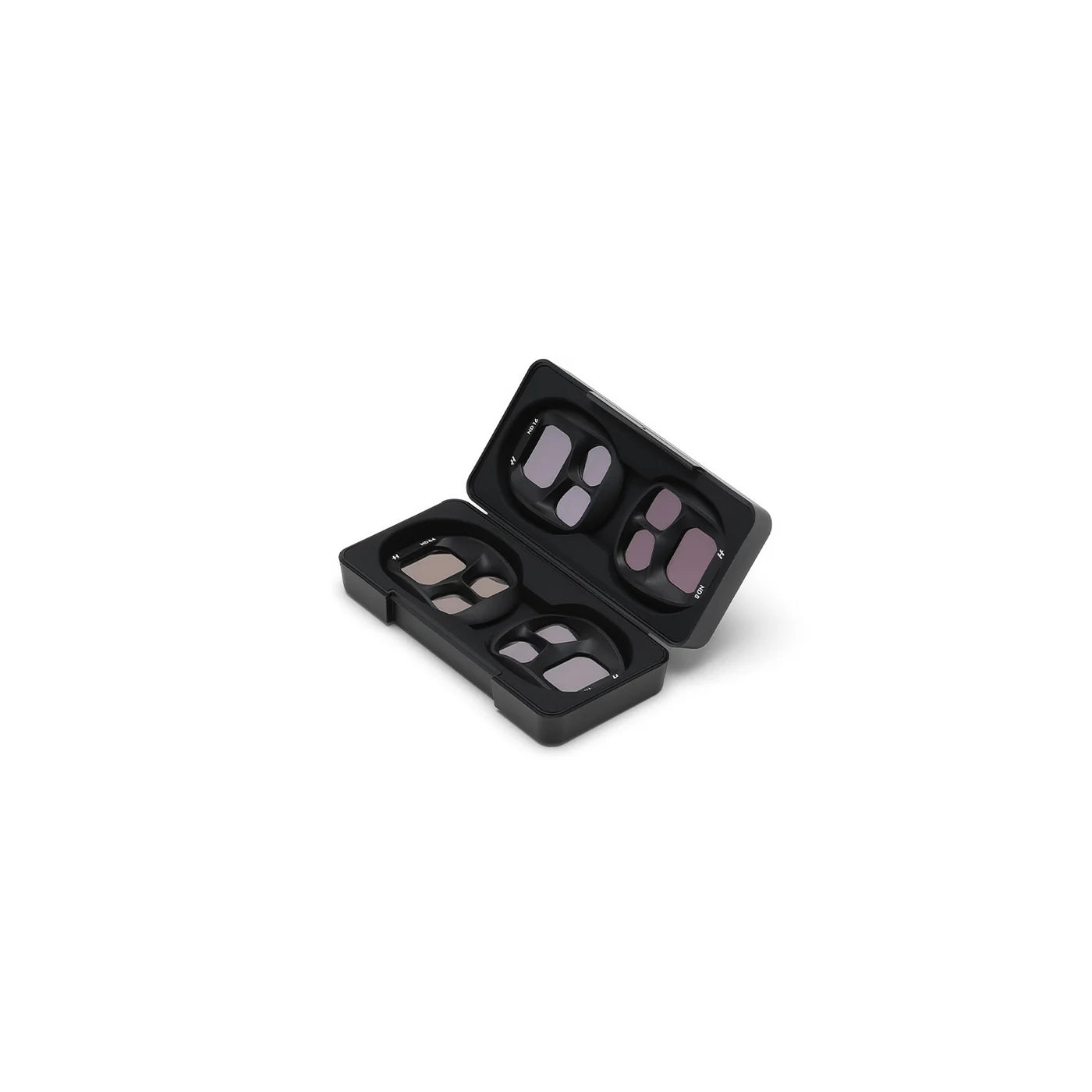 Set of makeup products in a black case on a white background
