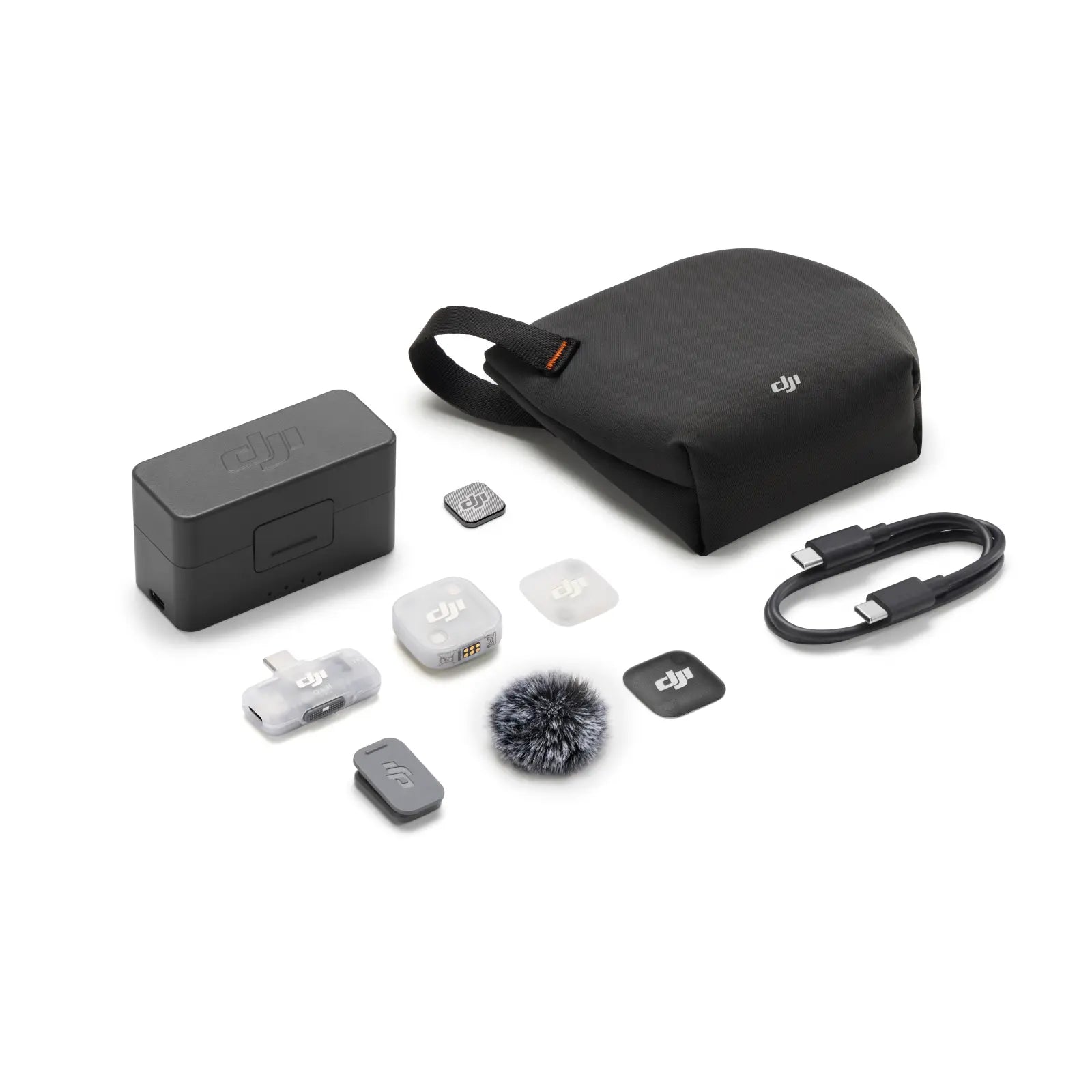 Collection of DJI accessories including a black carrying case on a white background