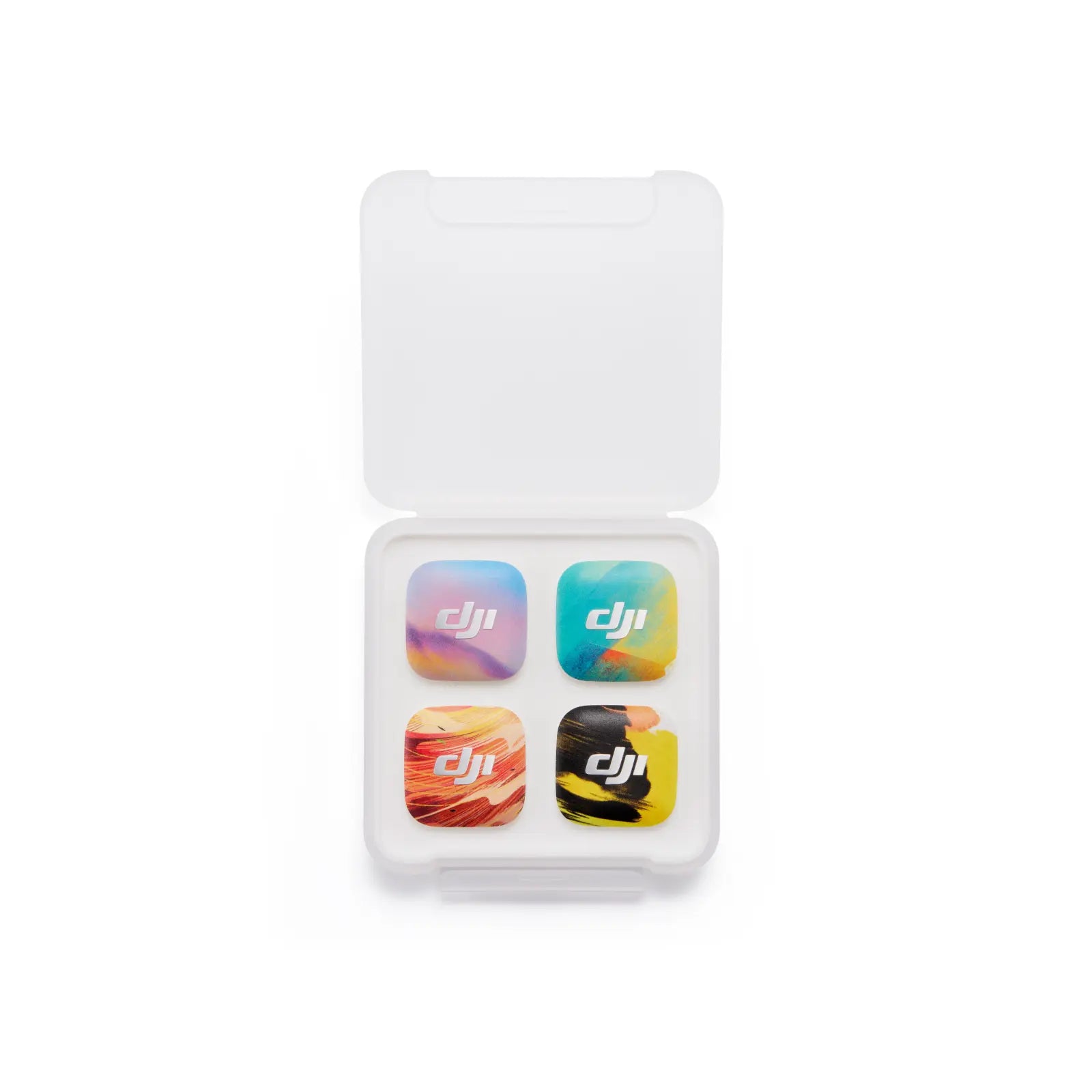 Four colorful stickers with DJI logo in a clear plastic case on a white background