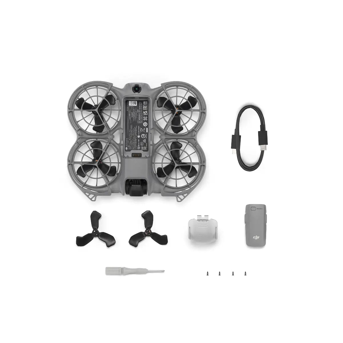 DJI Spark drone parts including propellers and tools on a white background