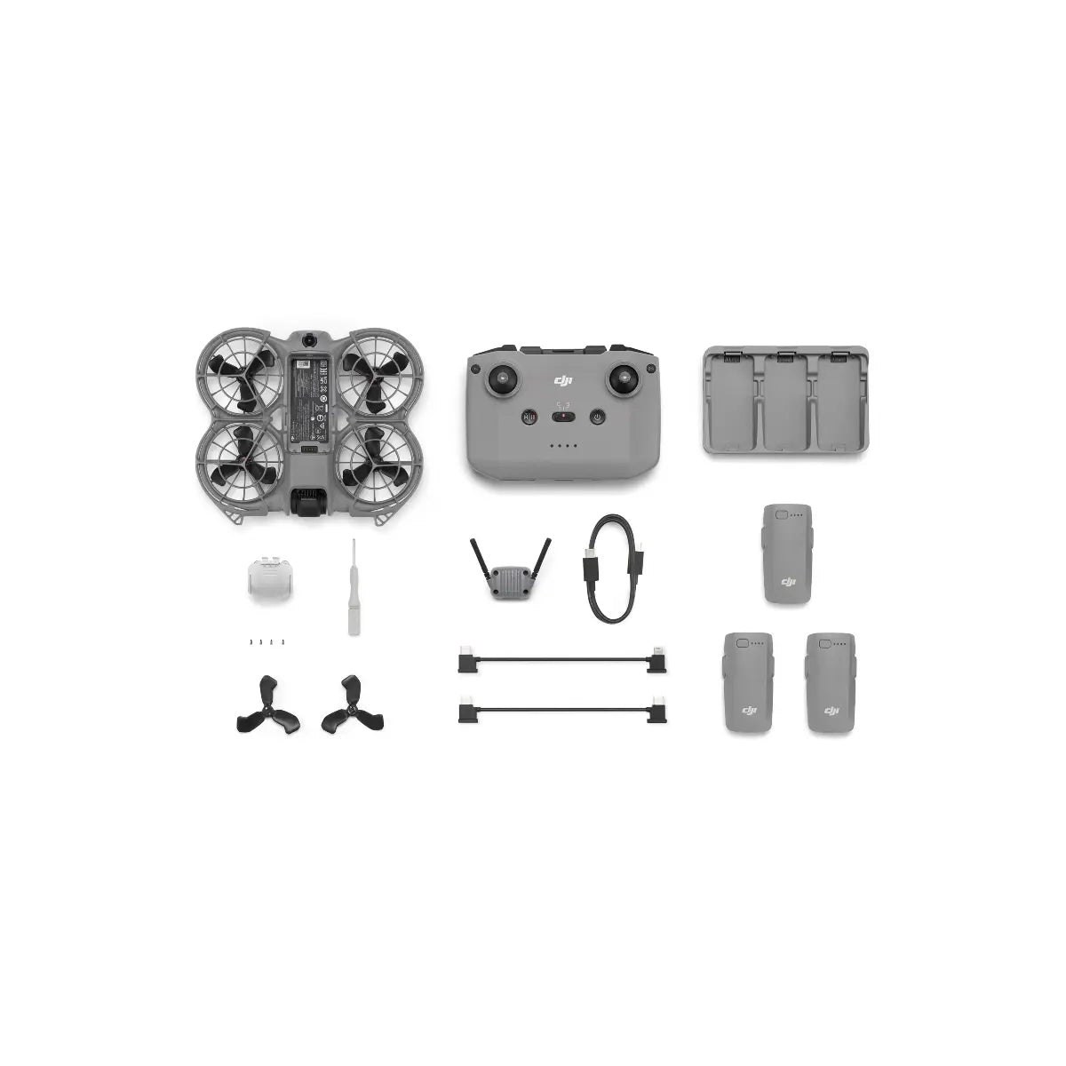 DJI Mavic Mini drone and accessories on a white background