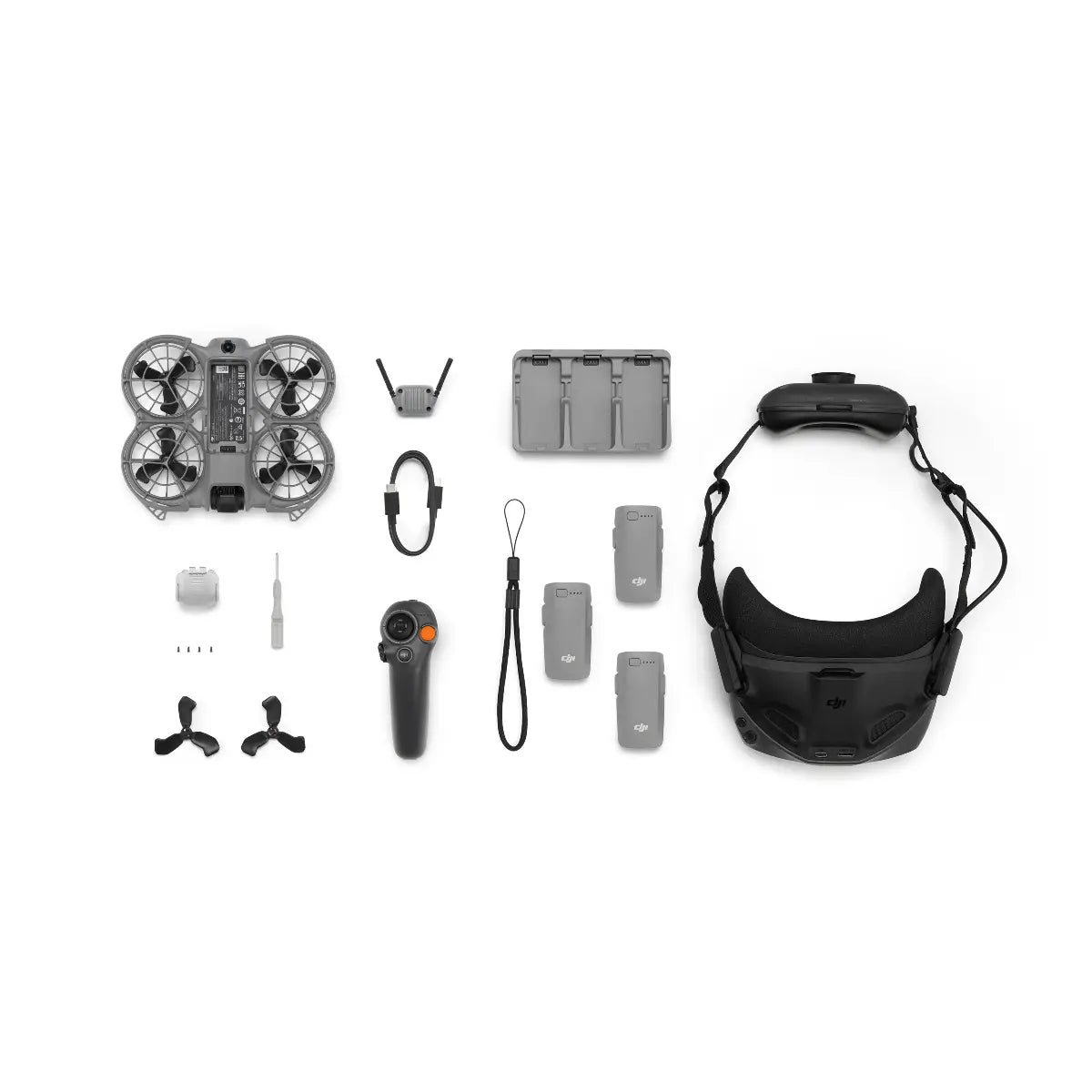 Collection of drone parts and accessories on a white background