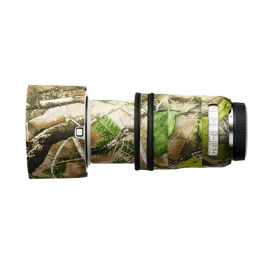 Camouflage camera lens on a white background