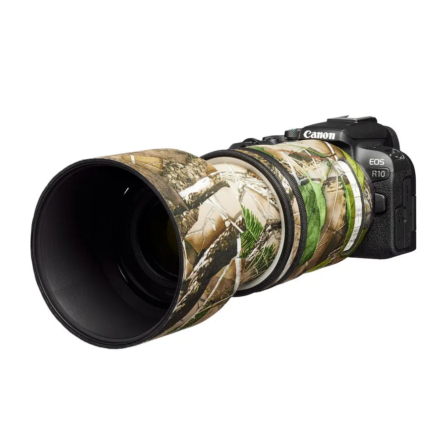 Canon camera with a camouflage lens cover on a white background