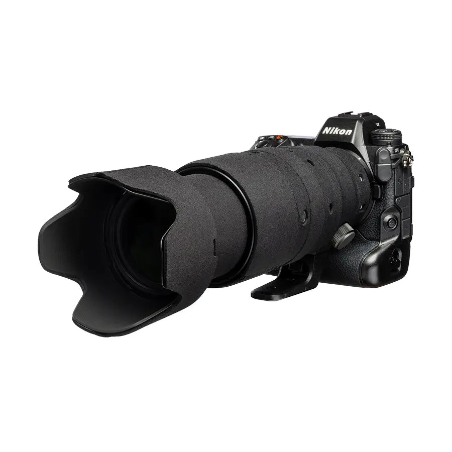 Nikon camera with a large lens on a white background