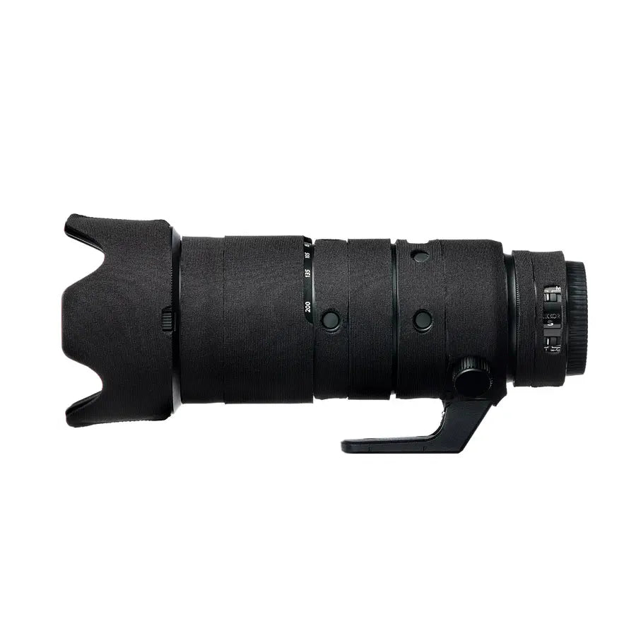 Black tactical scope on a white background