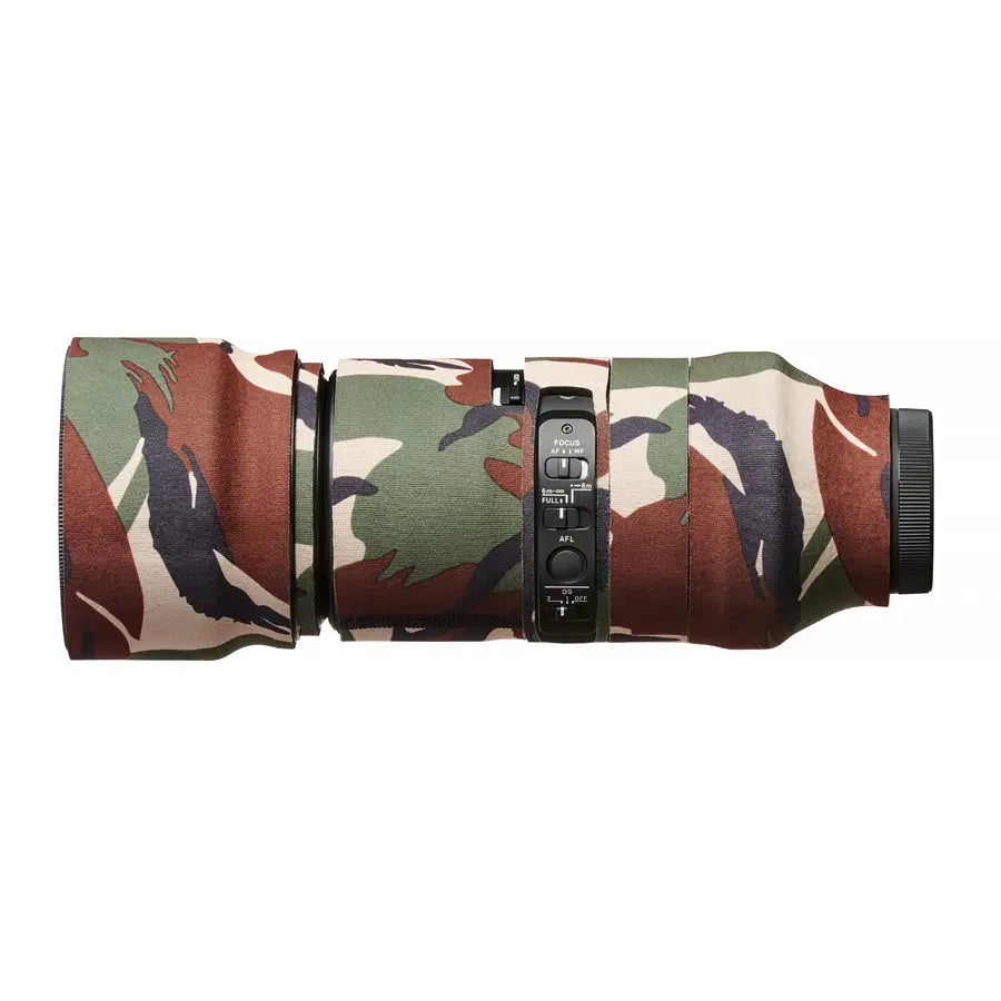 Camouflage-patterned camera lens on a white background