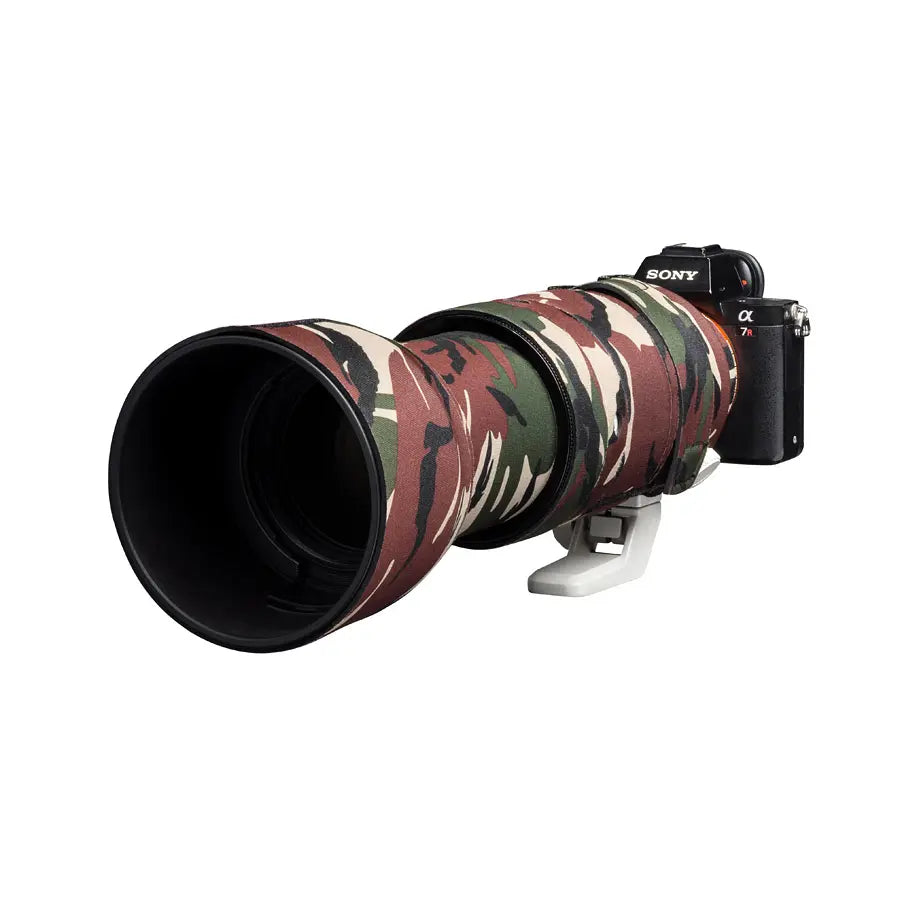 Camouflage camera lens with Sony camera body on a white background