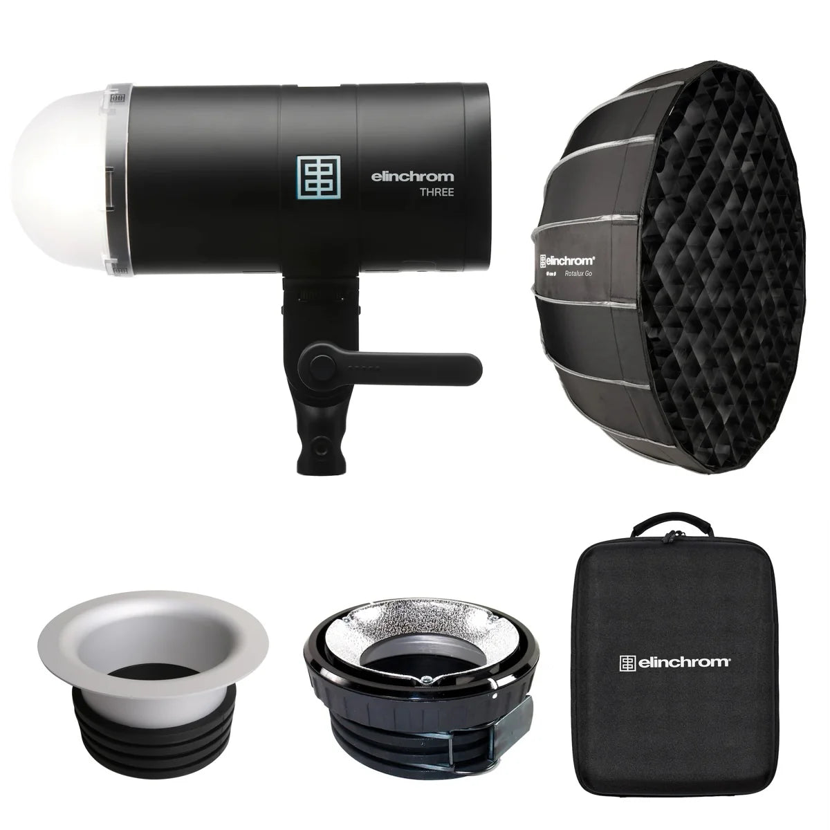 The image shows the Elinchrom THREE Portrait Kit, including an off-camera flash unit, a softbox attachment, various light shaper accessories, and a carrying case.