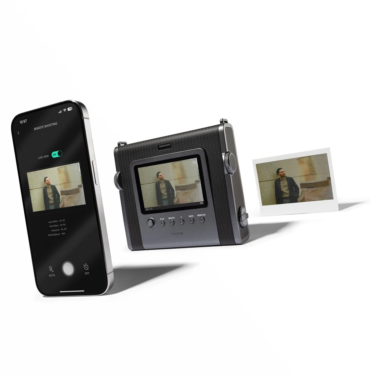 Fuji Instax Wide Evo Black Hybrid Instant Camera camera with photograph and mobile phone beside