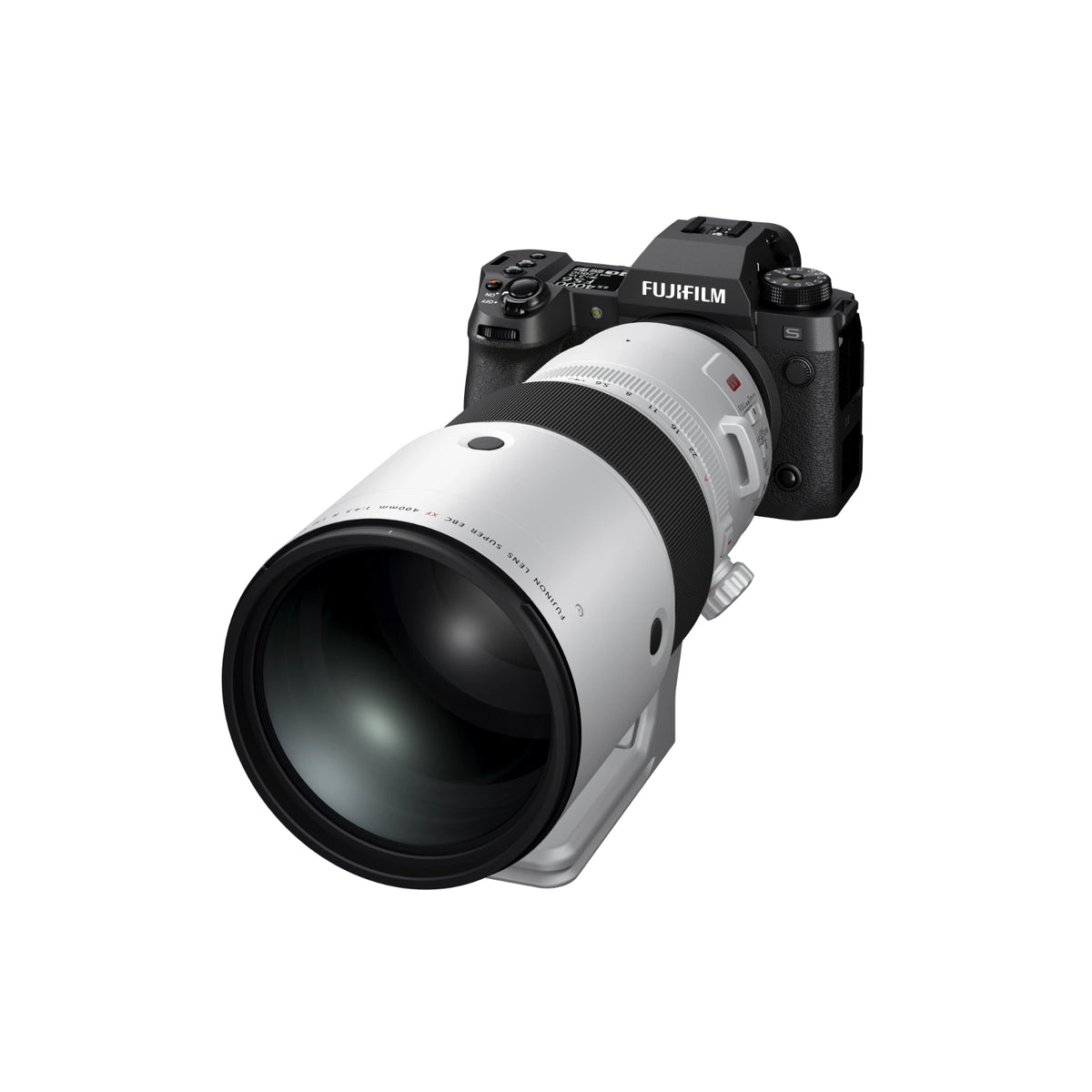A silver and black Fujifilm lens with an integrated stand attached to a camera, shown from the top against a solid white background.