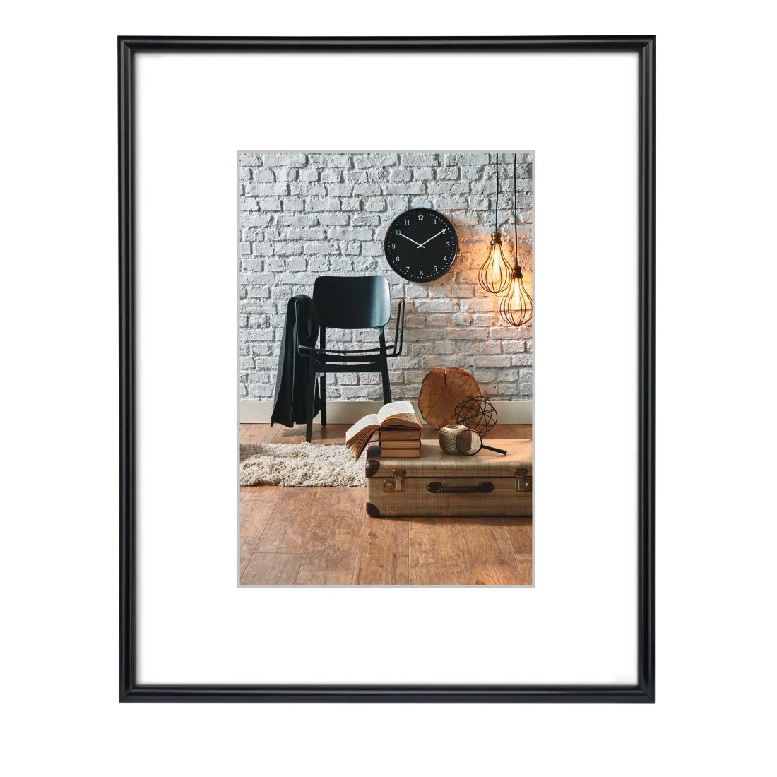 Framed interior design photo with a chair, clock, and decorative items against a brick wall.