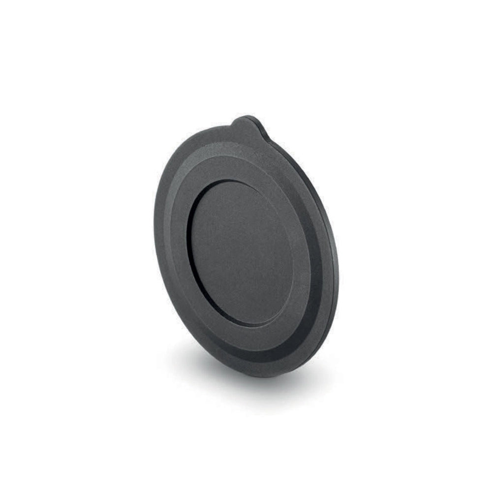 Black circular object on a white background