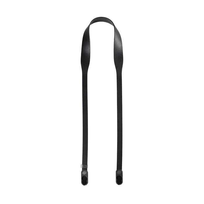 Black camera strap on a white background