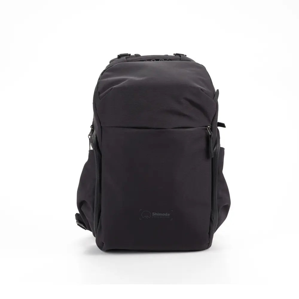 Black backpack on a white background