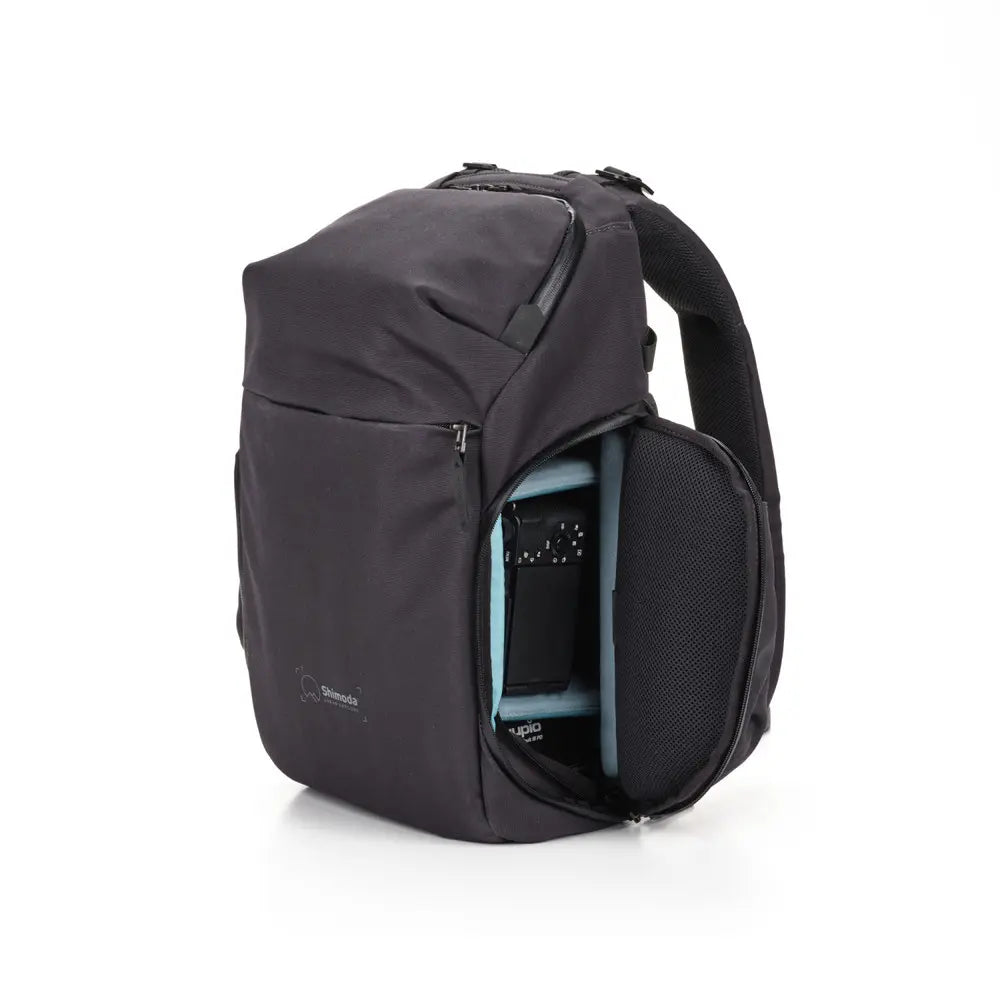 Black backpack with a visible brand logo on a white background