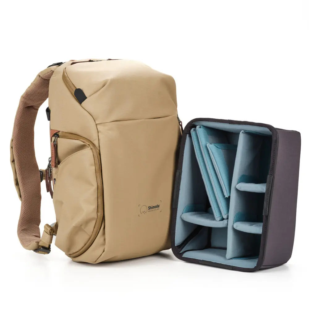 Beige backpack with a compartment organizer on a white background