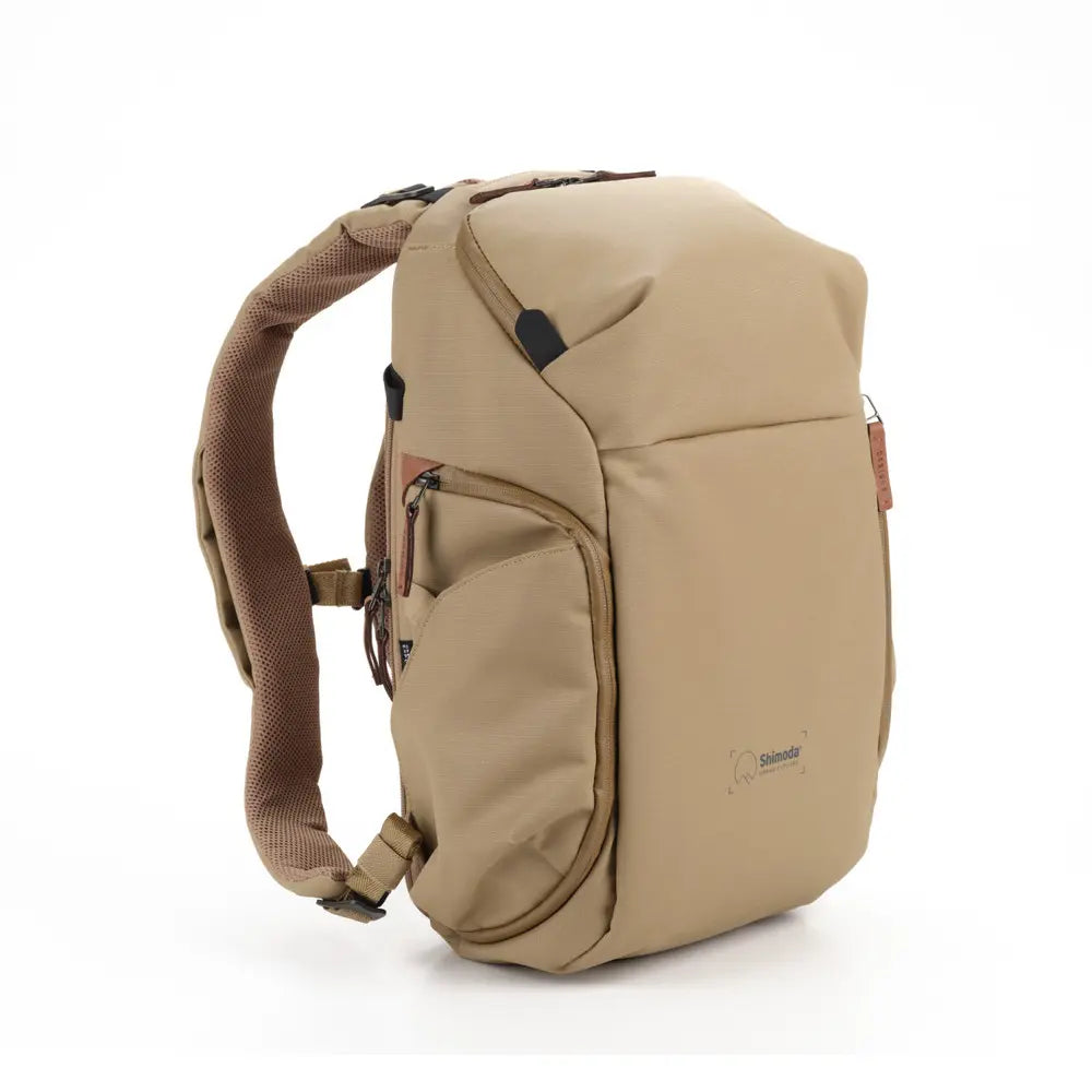 Beige backpack on a white background