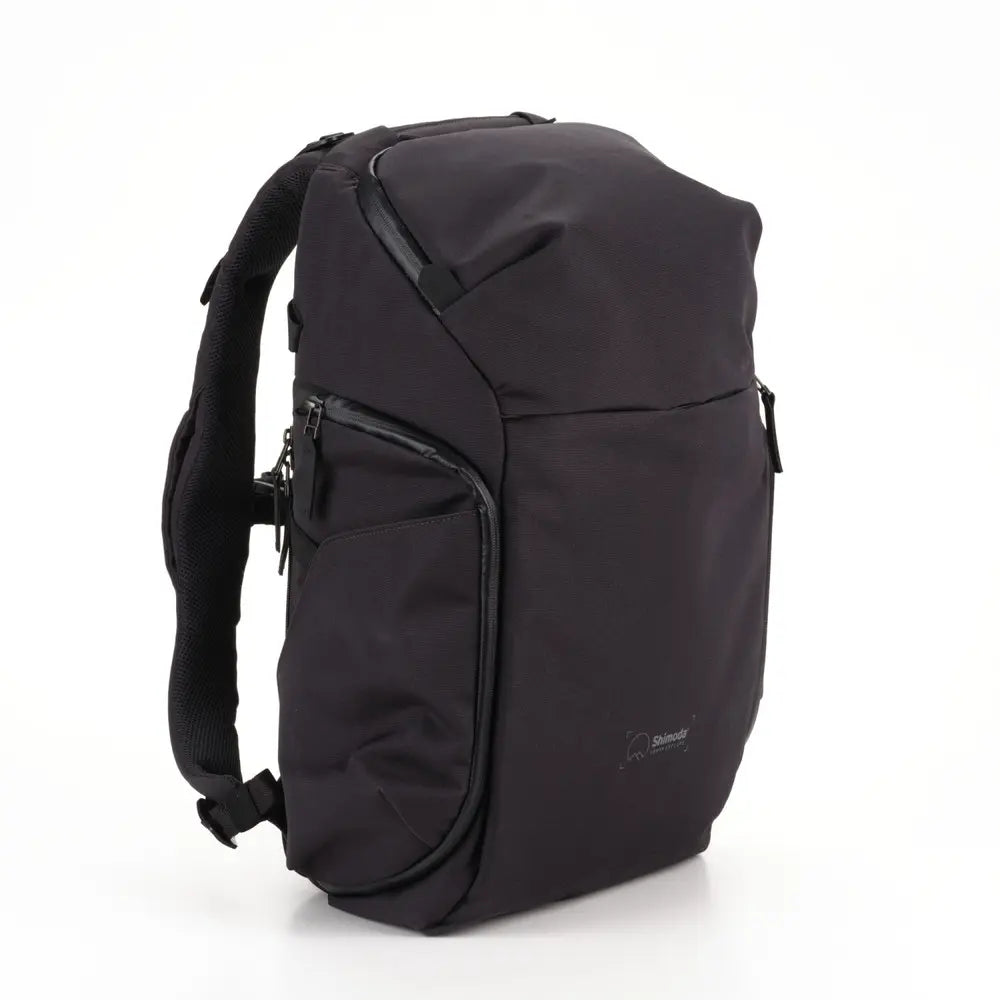 Black backpack on a white background