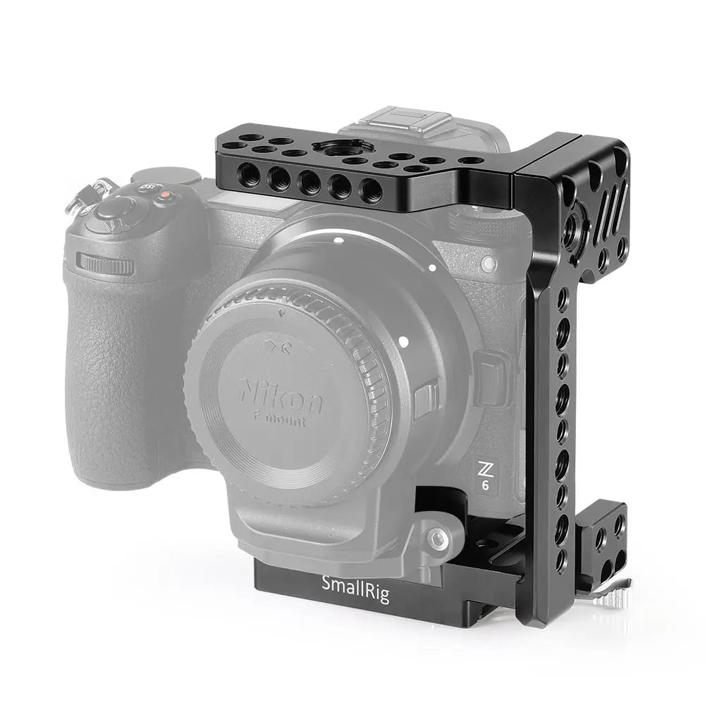 Camera with a black accessory mount on a white background