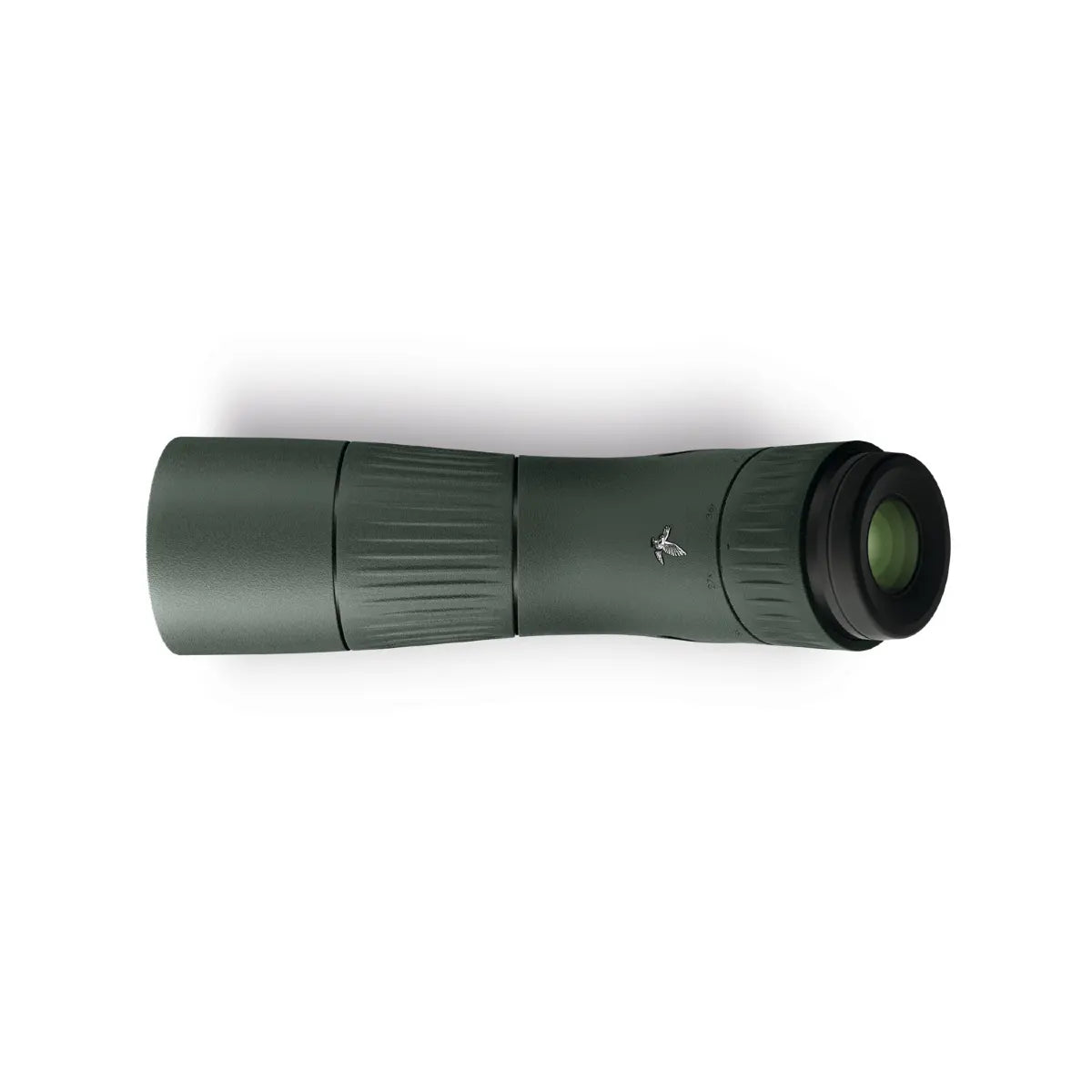 Green monocular telescope on a white background