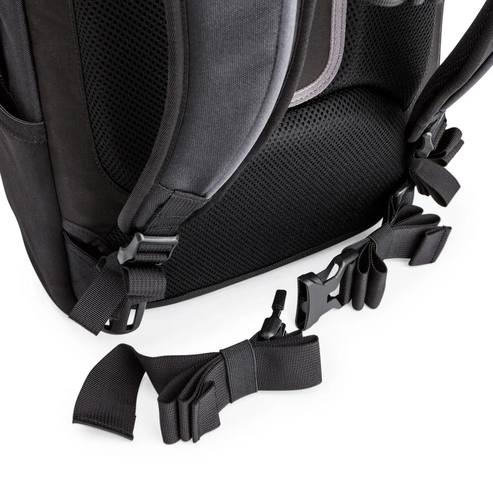 Black backpack with adjustable straps on a white background
