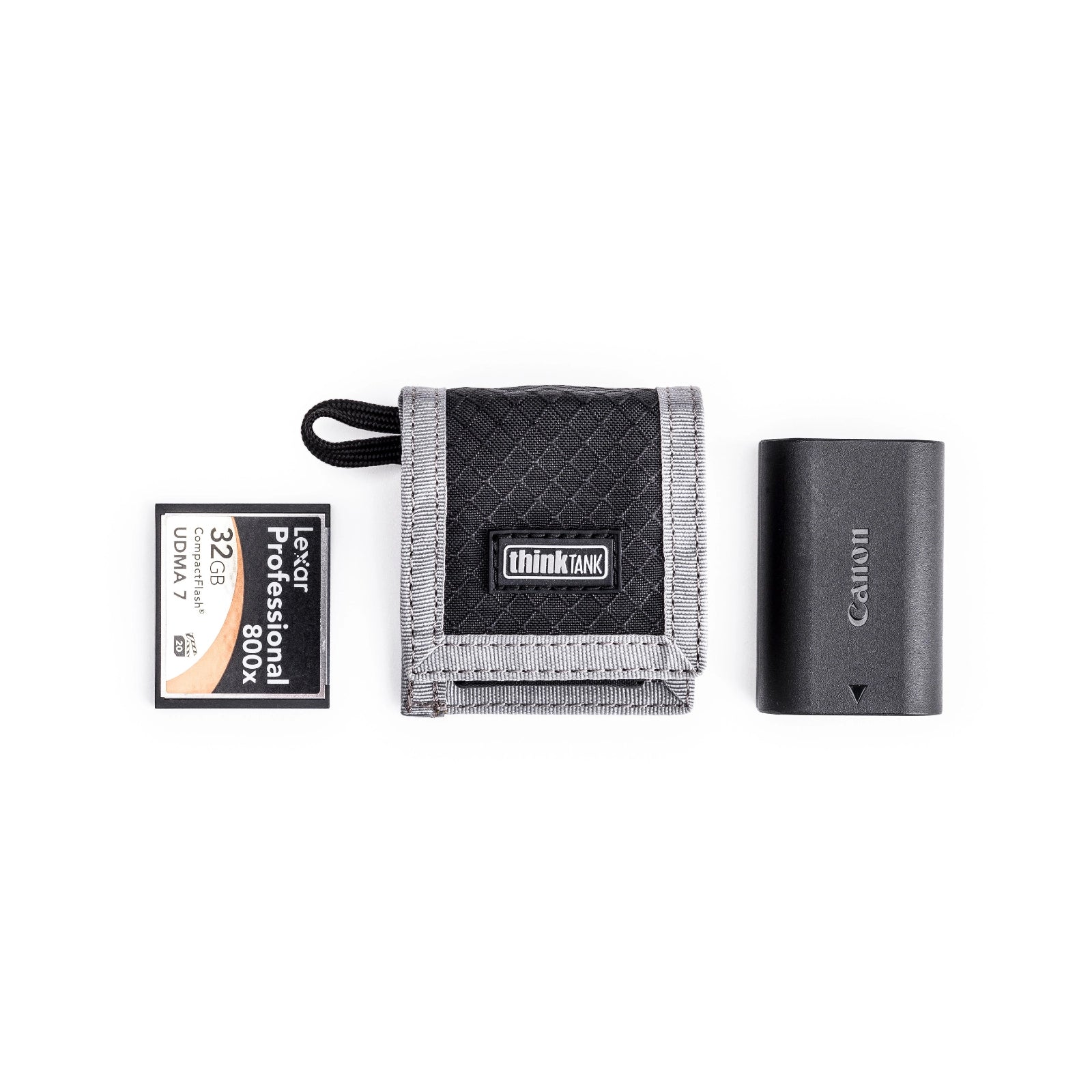 Think Tank CF SD Memory card and Battery Wallet front angle with battery and memory card beside