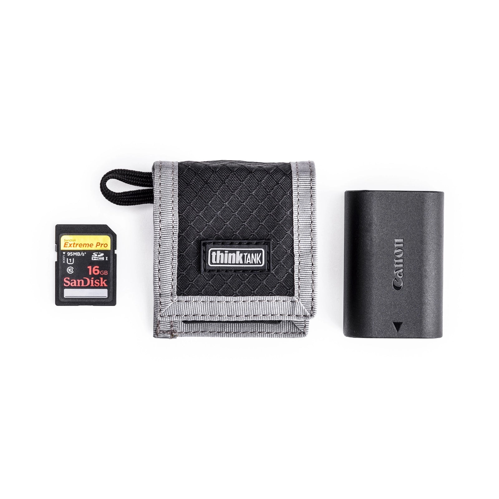 Think Tank CF SD Memory card and Battery Wallet front angle with battery and memory card beside 2