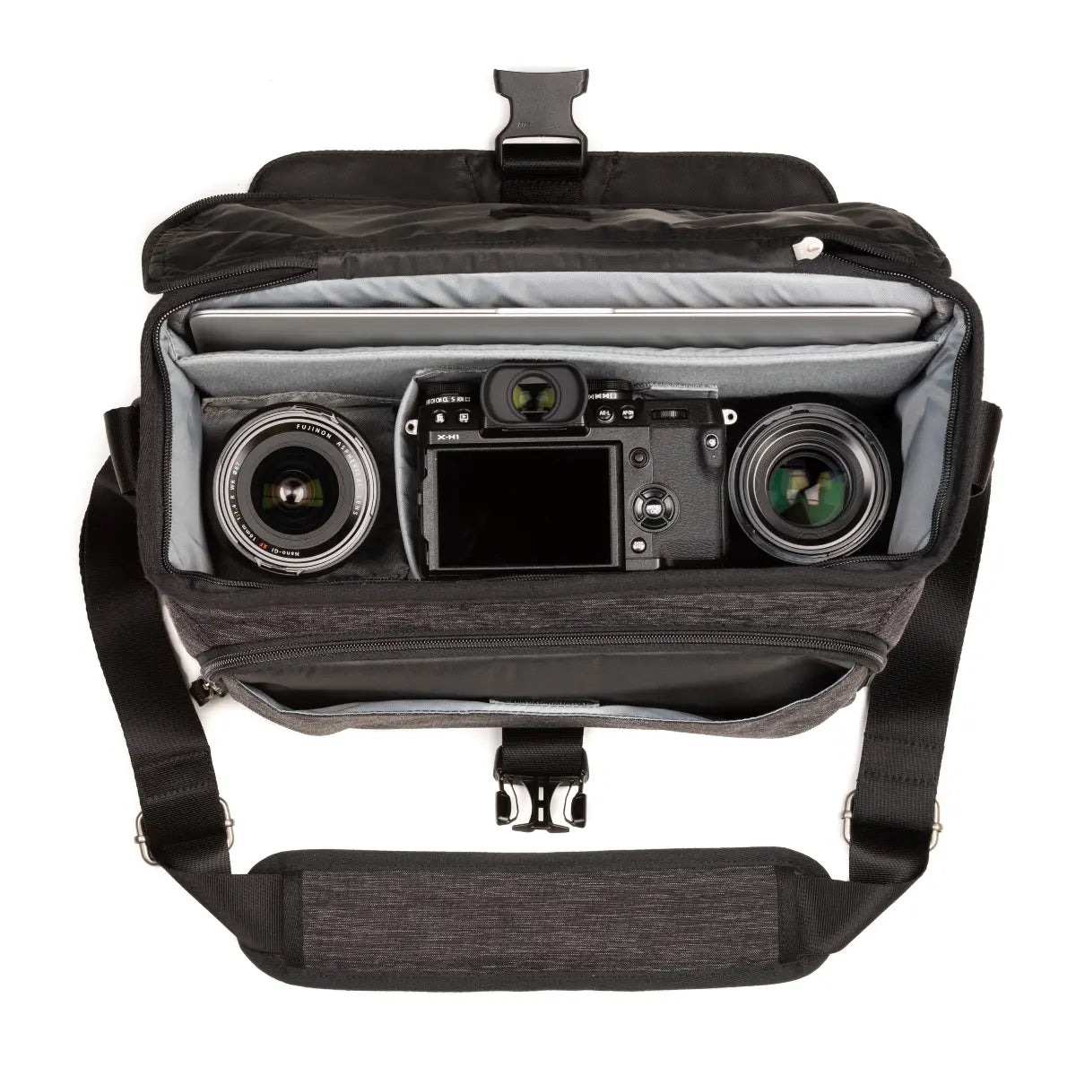 Camera bag with a camera inside on a white background