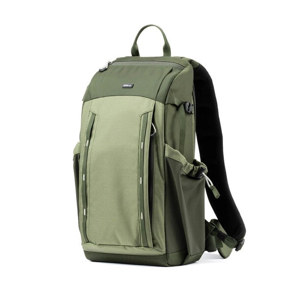 Green backpack on a white background