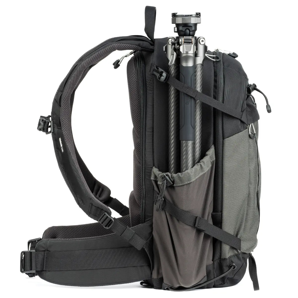 Black and gray backpack with camera equipment on a white background