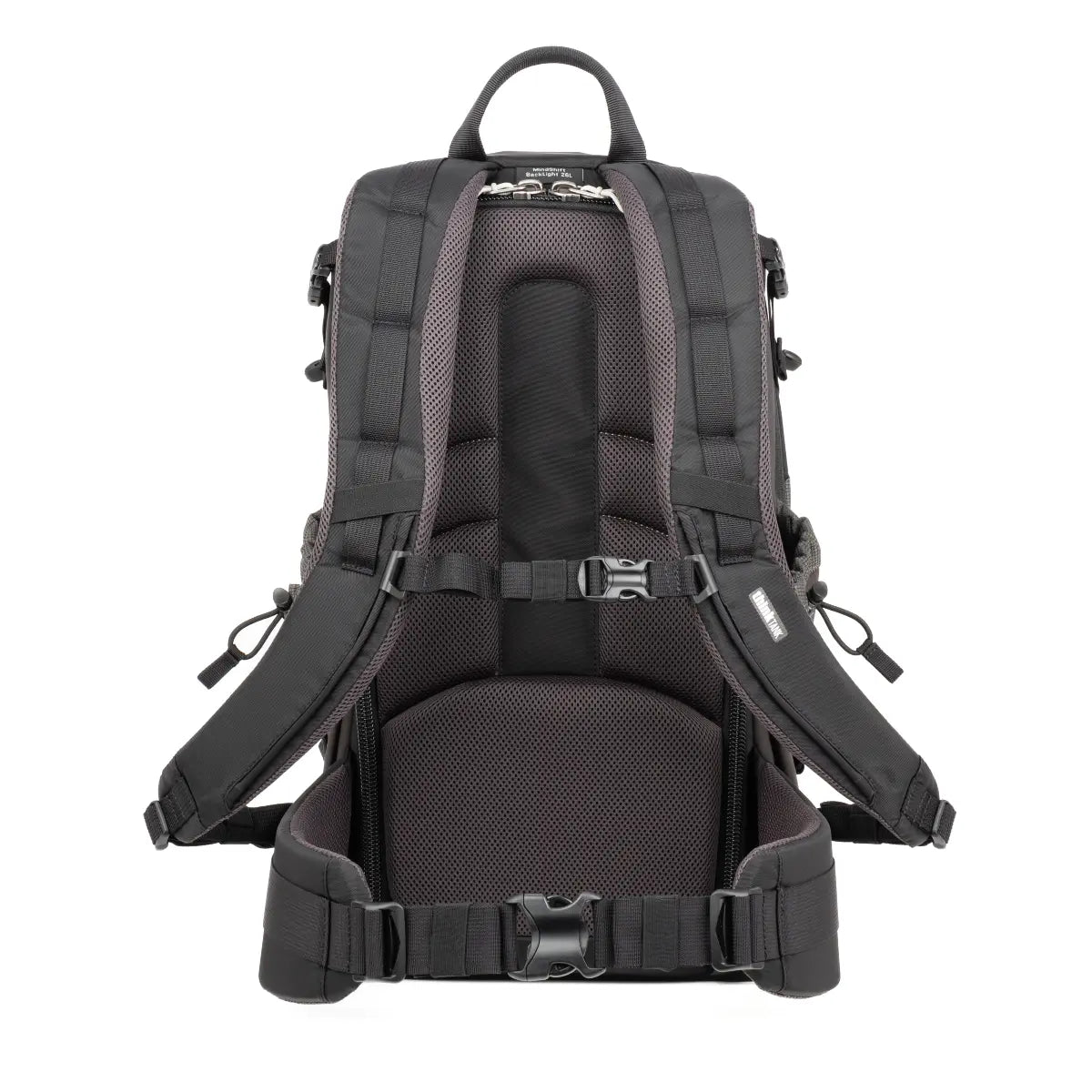 Black backpack with multiple straps and buckles on a white background