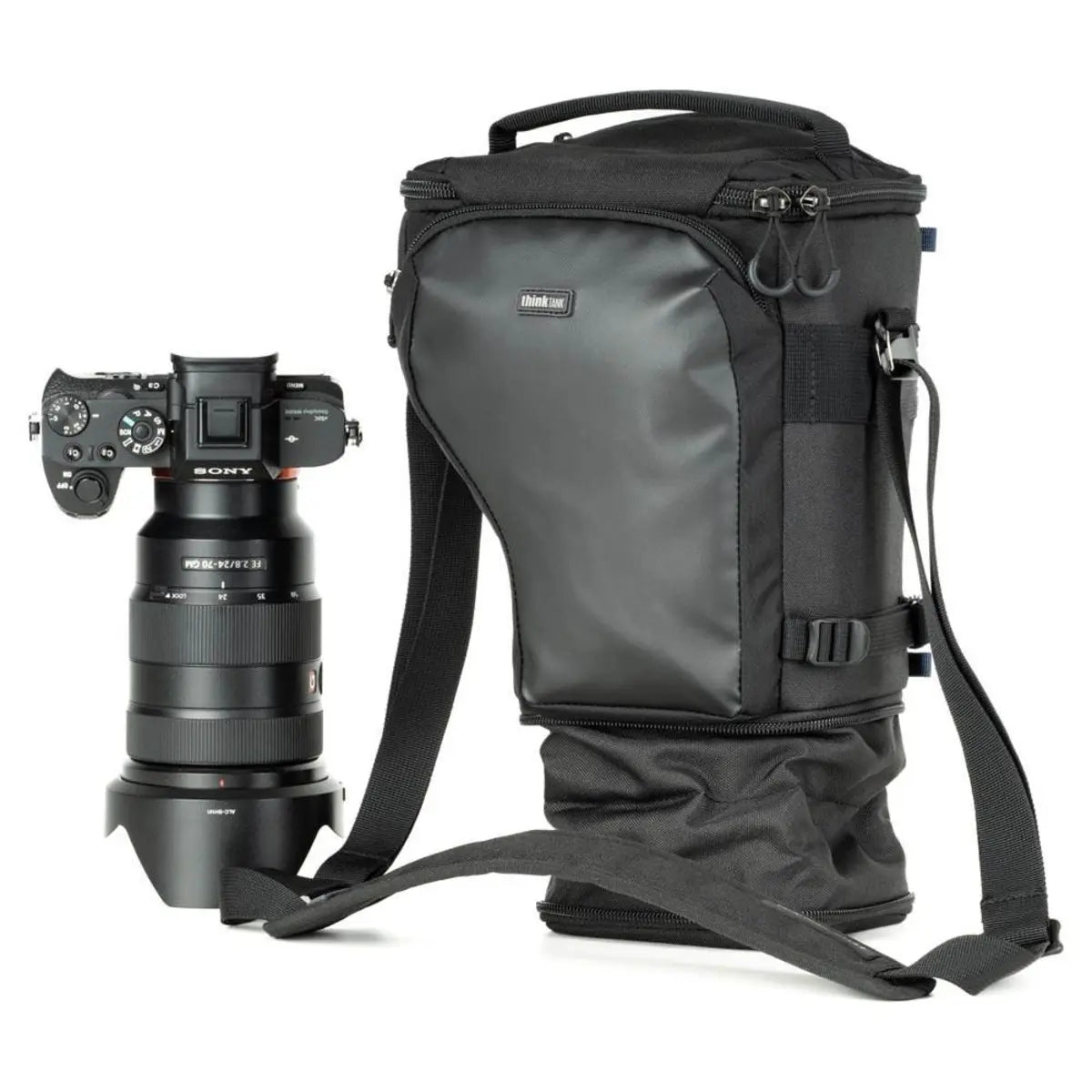 Black camera backpack with a camera on a white background