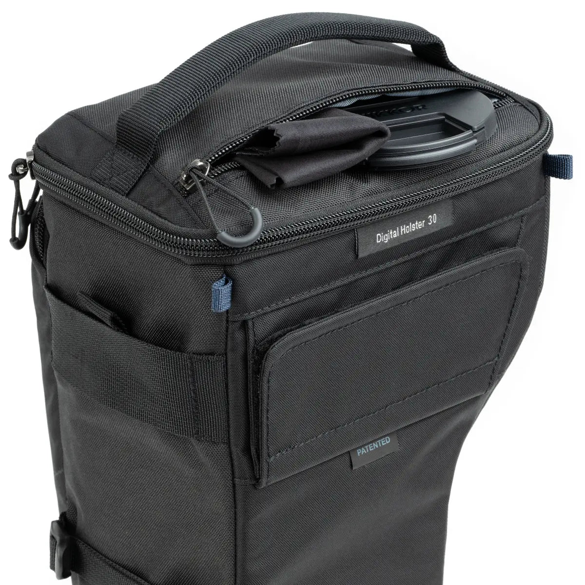 Black digital holder bag with zippers and visible brand name on a white background